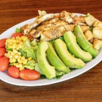 Avocado Chicken Salad · Romaine lettuce, Tomatoes, Fresh avocados, Sweet corn and seasoned grilled chicken. 