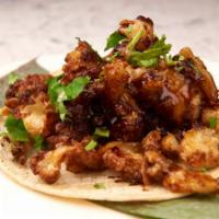 General Tso's cauliflower Taco · General Tso's cauliflower, scallion 