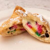 Rainbow Cookie Cheesecake Empanada · 