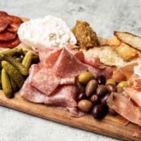 CHARCUTERIE AND CHEESE BOARD · Chef’s selection of house-made charcuterie, prosciutto, artisanal cheese, jams, fruit, bague...
