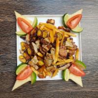Picada Munchies · Bits of Chicharron, Pork Loin, Chorizo, Arepas, Sweet Plantains, French Fries & Tomatoes