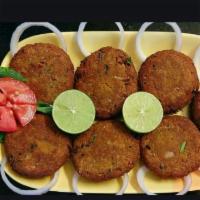 Shami Kebab · 2 deep fried beef patties with gram and loads of fragrant of authentic spices.