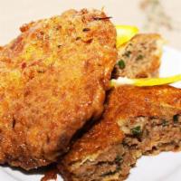 Jali Kabab · 2 beef patties with stuffed fried egg and spices.