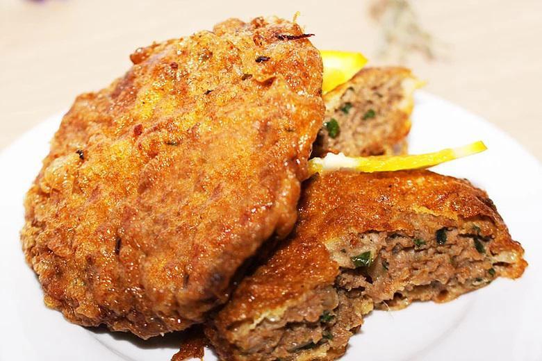 Jali Kabab · 2 beef patties with stuffed fried egg and spices.