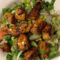 Chicken Kabab Salad · 2 skewers of chicken kabab marinated in traditional Afghan spices served on a fresh garden s...