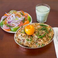 Kacchi Biryani · Dum mutton biryani. Slow cooked goat, basmati rice, saffron, and variety of authentic masala...