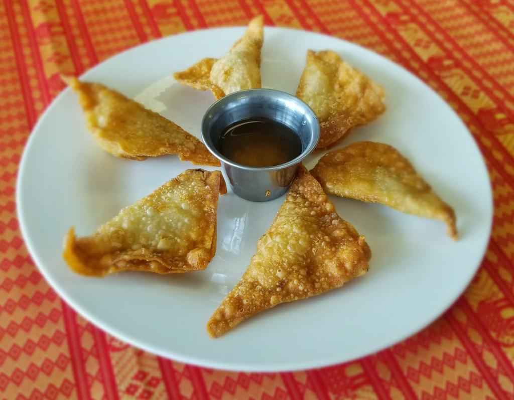 Fried Wontons · 6 pieces. Stuffed with ground pork and onions. Served with our house sauce.