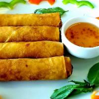 Fried Egg Rolls · 4 pieces. Ground chicken, mixed vegetables and clear noodles rolled in spring roll shell. Se...