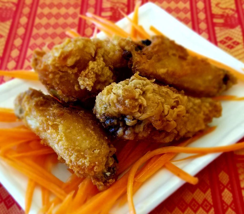 Golden Wings · 5 pieces. Deep fried chicken wings.