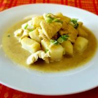 Yellow Curry · Potatoes and onions simmered in coconut milk.