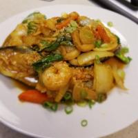 Seafood Curry Specialty · Stir fried seafood sauteed with garlic, eggs, mushrooms, celery, bell peppers, pik pow sauce...