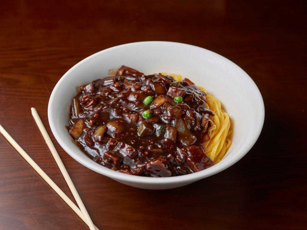 Ja Jang Myun 짜장면 · Freshly made noodles with pork and vegetables in black bean sauce.