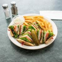 Turkey Club · Sliced turkey, bacon, lettuce, and tomato.