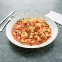 Seafood Chioppino · Mussels, clams, shrimp, and scallops sauteed in our homemade marinara sauce served over cape...