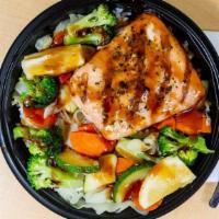 Salmon Teriyaki Rice Bowl · Wok-seared broccoli, cabbage, carrots and zucchini over a bed of white or brown rice topped ...