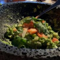 Guacamole · Avocado, tomato, fresh lime, serrano chile, onion, cilantro.