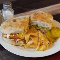 Grilled Chicken Sandwich · Grilled chicken breast, mozzarella cheese, onions, lettuce, tomatoes with mustard on homemad...