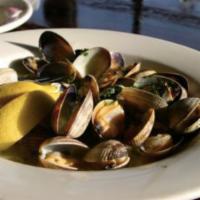 Steamed Clams · Local manila clams, white wine, lemon, garlic butter