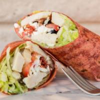  1072. Greek Wrap · Sliced grilled chicken breast, lettuce, tomato, onion, olives, feta cheese and Greek dressing.