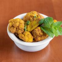 Aloo Ghobhi · Fresh cauliflower and potatoes cooked with herbs and spices.