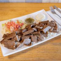 Gyro & Rice Entree · Thin slices of roasted meat.