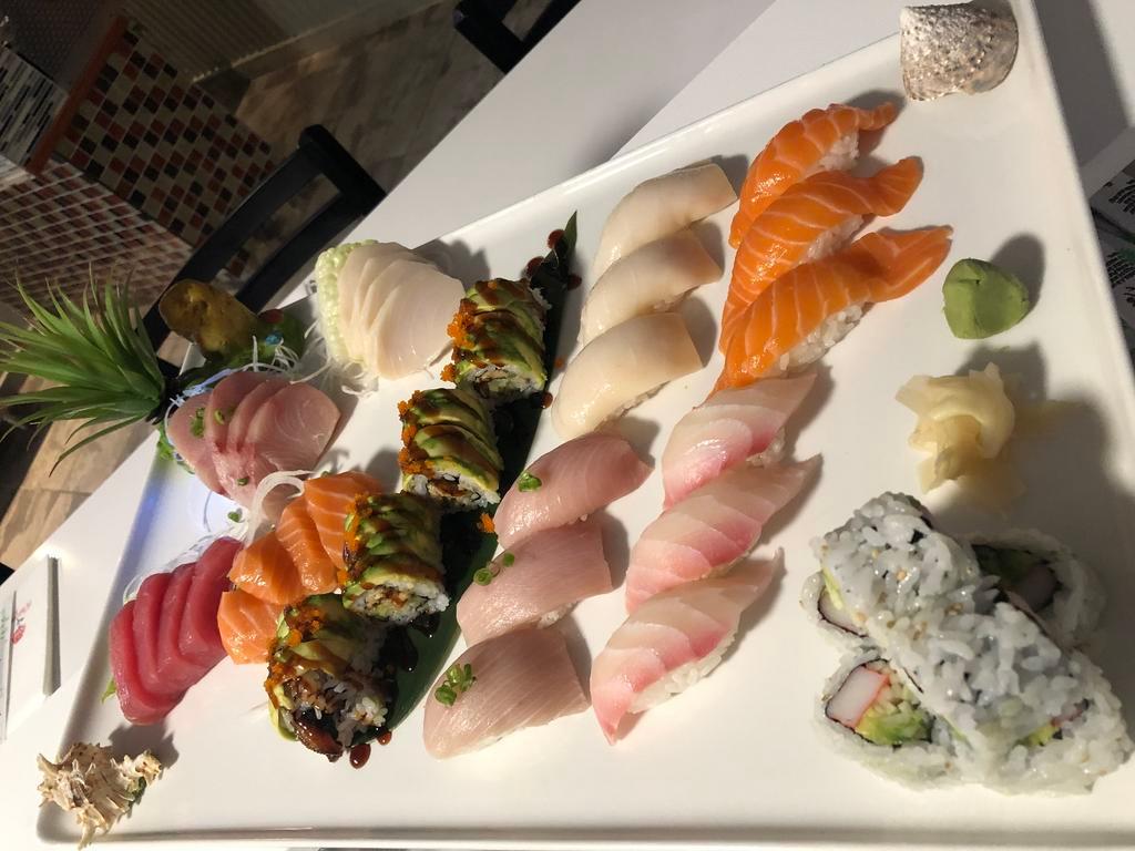 10. Lover Boat For 2 · 12 pieces sushi, 16 pieces sashimi, 1 California roll & 1 dragon roll.
