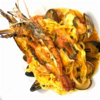 Linguini Ai Frutti di Mare · Linguini with Mixed Seafood, a Light White Wine Sauce, and Tomato Concasse