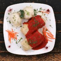 Stuffed Cabbage / Gołąbki · Leaves of cabbage stuffed with pork and rice. Two golabki served with mashed potatoes and ze...