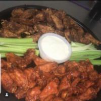 50 Piece Wings · Succulent meaty 100% organic wings with your favorite sauce, served with fresh celery, and y...