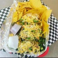 Fried Taco Basket (Beef) · 3 seasoned ground beef tacos, in a homemade tortilla shell, topped with fresh lettuce, tomat...