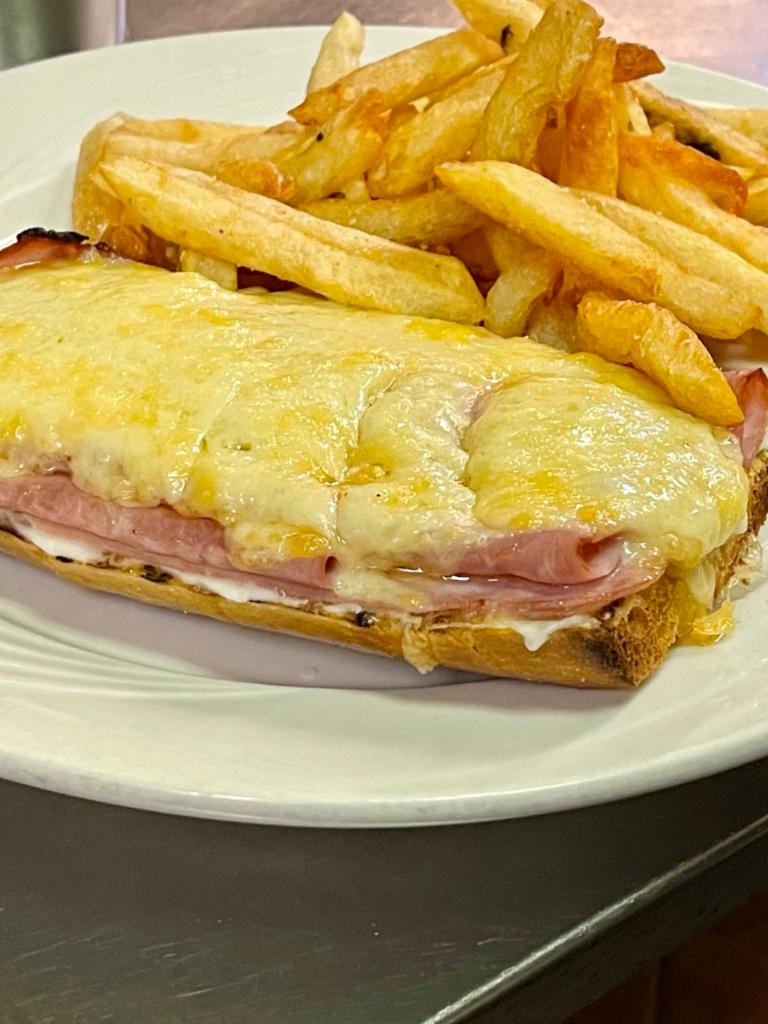 Croque Monsieur · Open-faced sandwich, ham, Gruyère, bechamel.