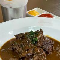 Carbonnade Flamande Plate + Frites  · Belgian beef stew, simmered for 4 hours in prepared with Belgian dark beer. Served with frit...