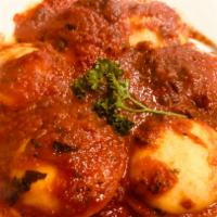 Ravioli di Casa Pasta (Dinner) · Ravioli filled with reggiano, ricotta and mozzarella in a tomato basil marinara.