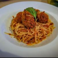 Spaghetti Bolognese (Dinner) · Spaghetti pasta topped with meat sauce.