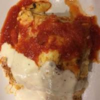 Lasagna a Paisana (Dinner) · Lasagna pasta layered with ricotta cheese and meat sauce