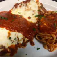 Pollo Parmigiana (Dinner) · Breaded and pounded boneless chicken breast baked with marinara, basil, and mozzarella chees...