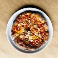 Pepperoni Pizza · Molinari pepperoni, mozzarella, and tomato sauce.