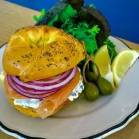 LOX SANDWICH · Our House Cured(with Gin) Gravlax, Cream Cheese, Capers, Red Onion sandwiched between your c...
