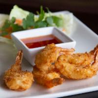 Coconut Shrimp · Fresh shrimp with coconut batter fried to a golden brown served with sweet and sour sauce.