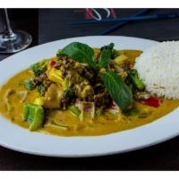 Beef Curry Specialty · Beef tenderloin and fresh vegetables sauteed in coconut curry sauce served with steamed jasm...