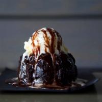 Lava Cake · Molten chocolate cake topped with vanilla ice cream.
