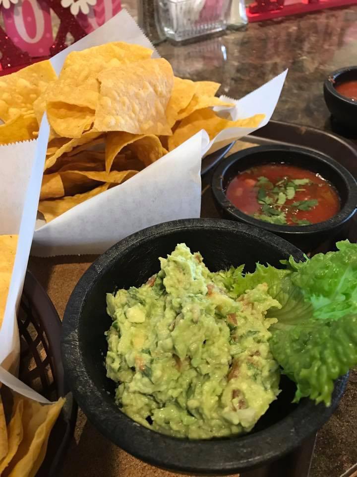 Guacamole · Fresh avocado blended with diced tomatoes, onion, cilantro, serrano peppers and spices.
