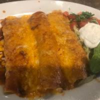 2 Enchiladas Combo · Two delicious enchiladas filled with your choice seasoned chicken, ground beef, shredded bee...