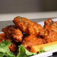 Chicken Wings · Breaded chicken wings with choice of sauce; Pendragon IPA buffalo, Firestone DBA BBQ or swee...