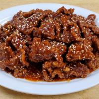 C04. Sesame Beef · Spicy. Crispy sliced beef sauteed in a famous spicy sesame sauce.