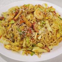 C13. Singapore Rice Noodle · Spicy.  Dry sauteed rice noodle with BBQ pork, shrimp, egg, onion and curry.