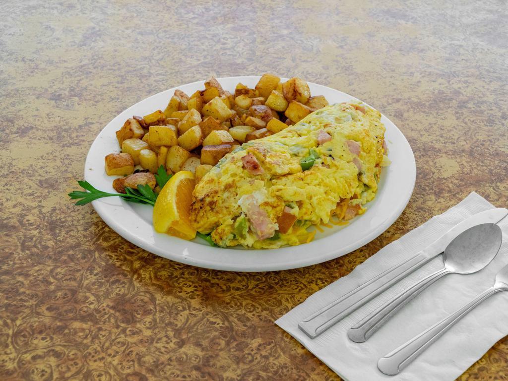 Ham Denver Omelet · Ham, bell peppers, onions, cheddar cheese.