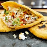 Carne Asada, adobada or chicken Gordita · Made with masa and stuffed with meat queso fresco, lettuce sour cream & pico de gallo. 