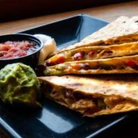 Quesadilla · Giant tomato-basil tortilla loaded with pepper jack cheese, red beans, bell peppers, and you...