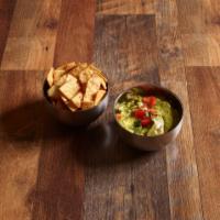 Guacamole and Chips · Homemade flour tortilla chips and freshly made guacamole.